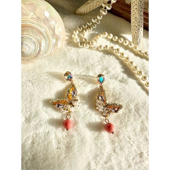 Orange color beaded and iridescent butterfly dangle earrings ￼ - Picture 1 of 3